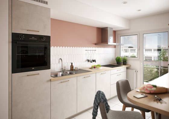 Cocina moderna con muebles beige y encimera de madera clara